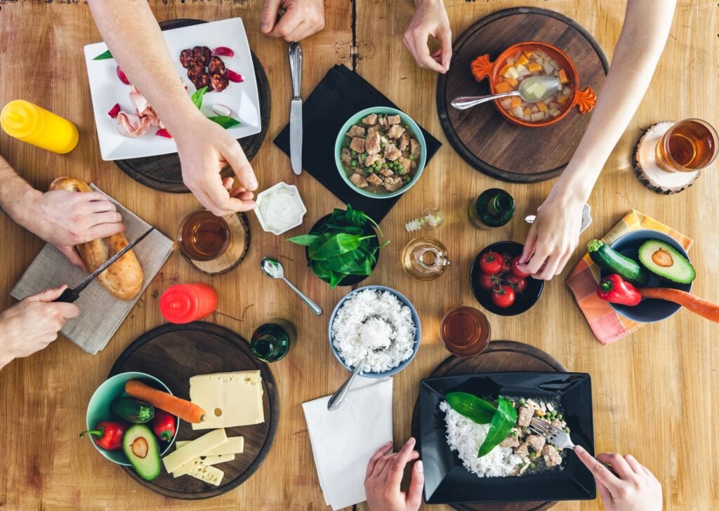 Top view, Group of people sitting at the table having meal